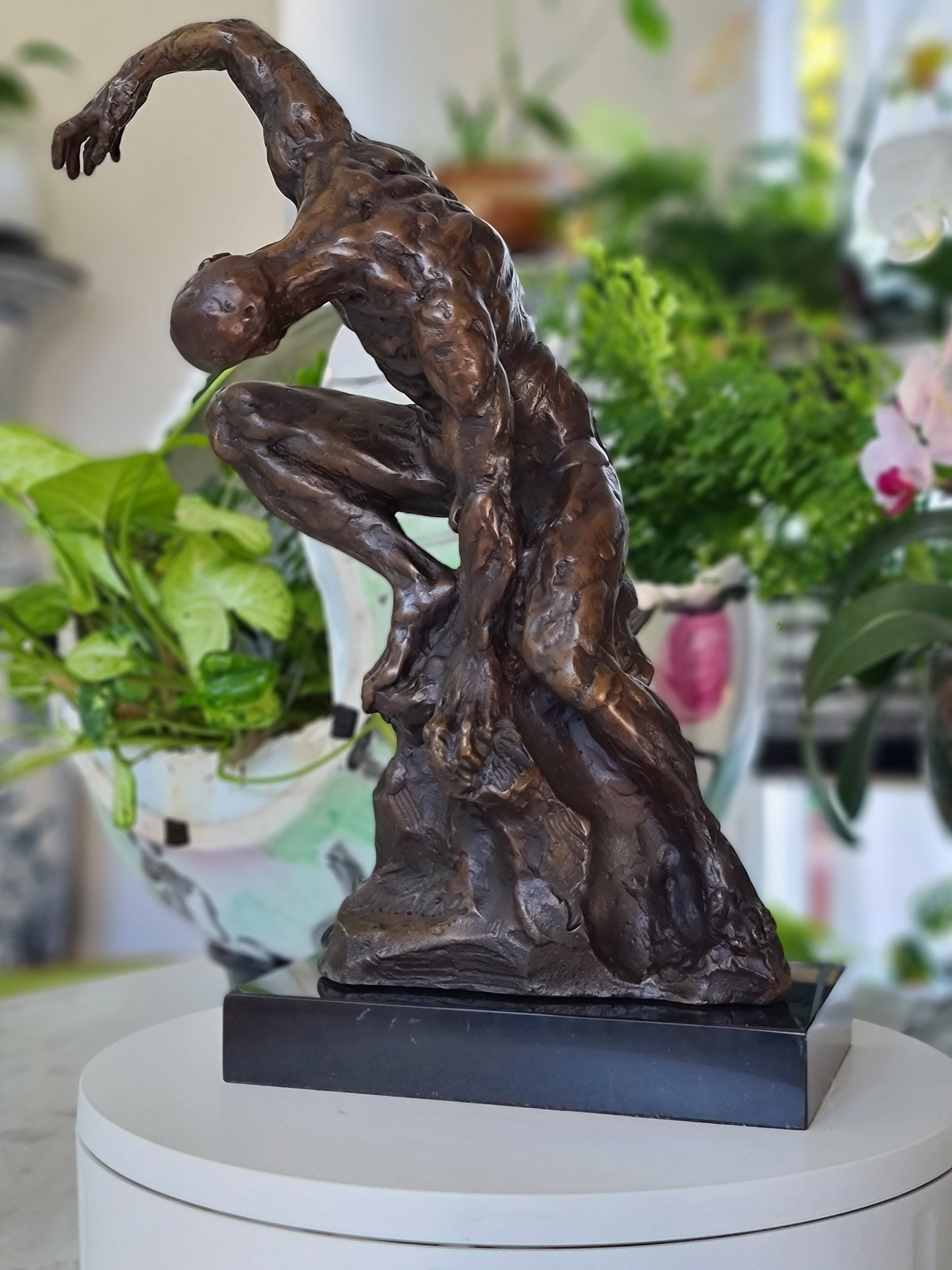 An Imposing Sculpture Of Naked Muscular Man