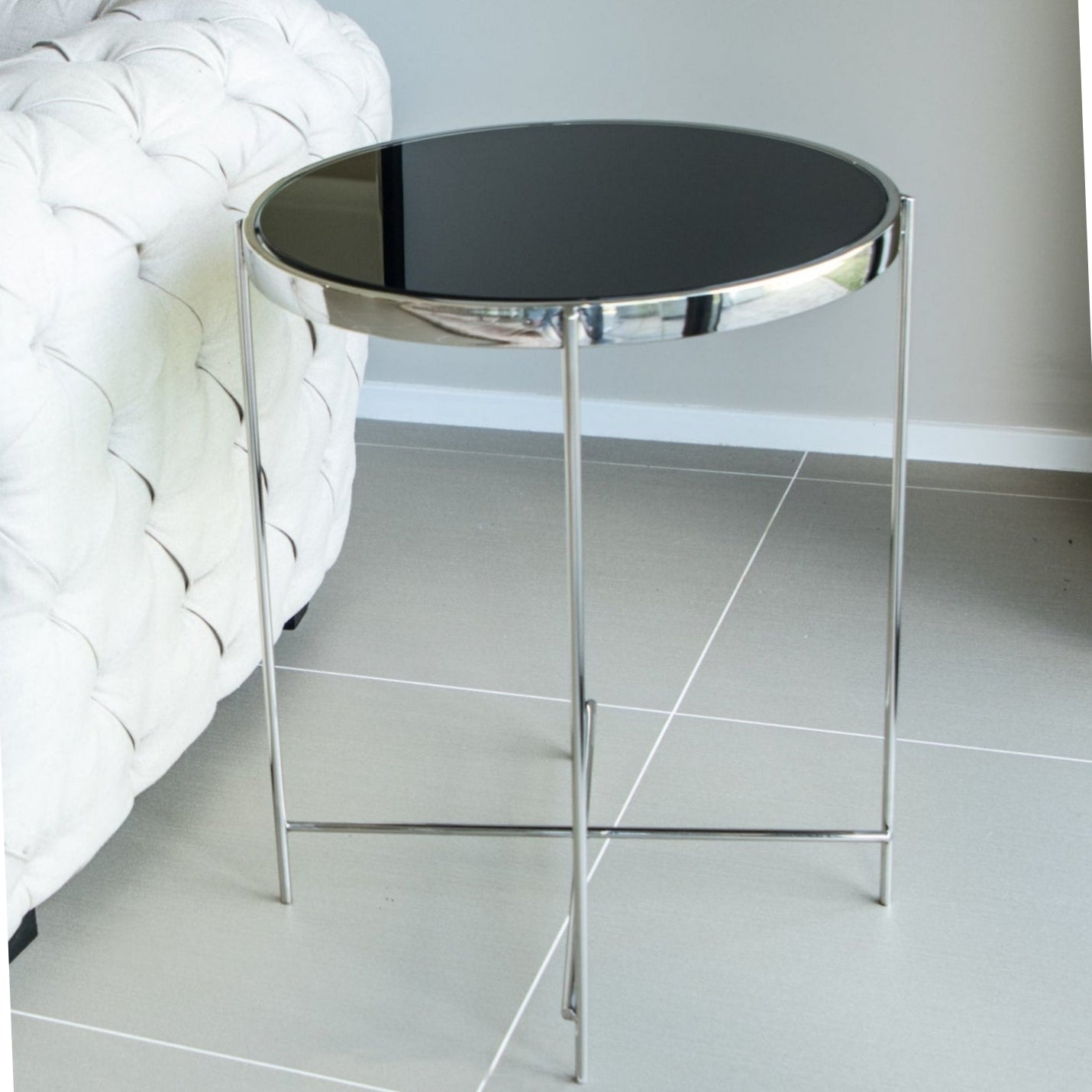 Dilva Polished Stainless Steel Side Table with Black Glass Top.
