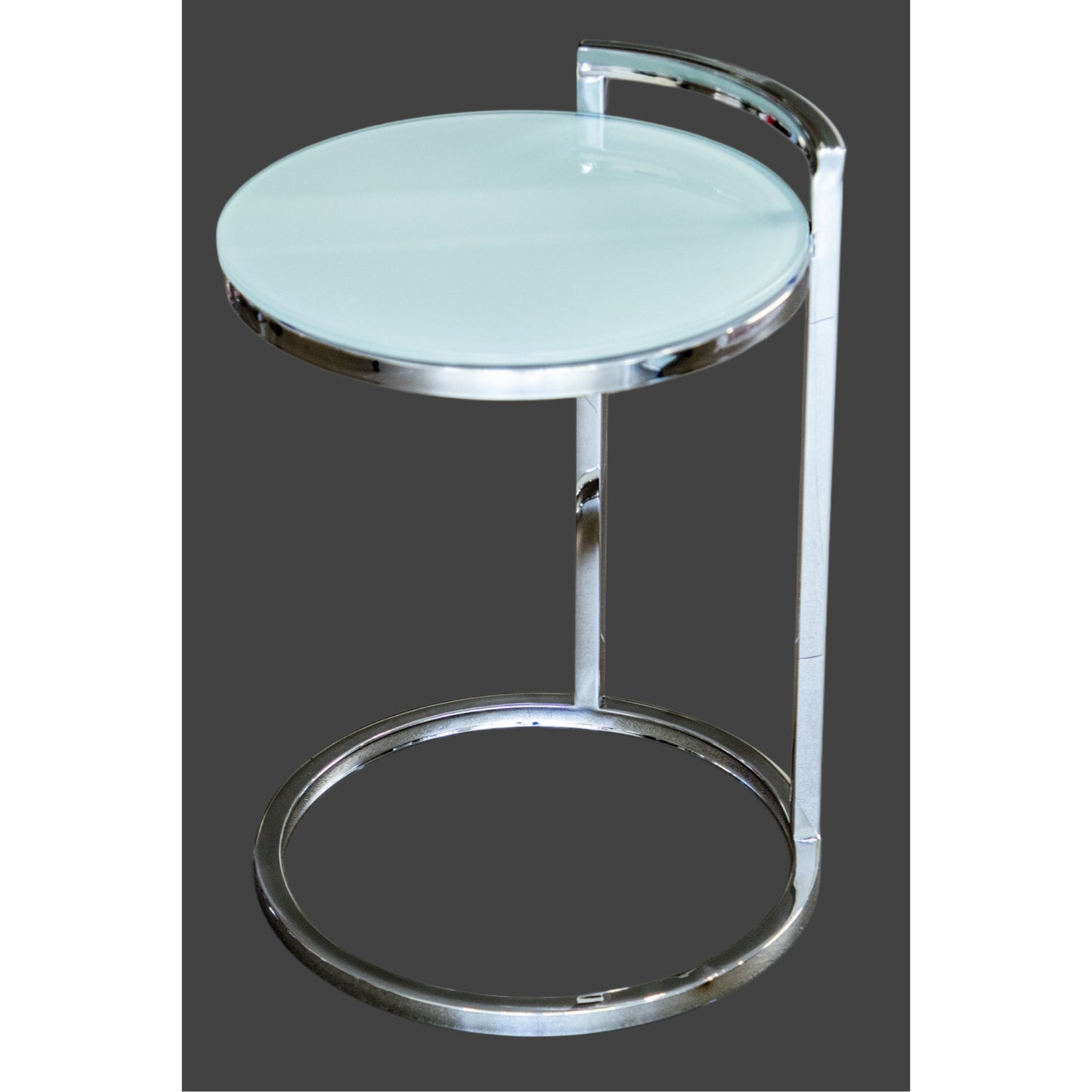 A stainless steel side table with a mirror polished finish and a white tempered glass top.