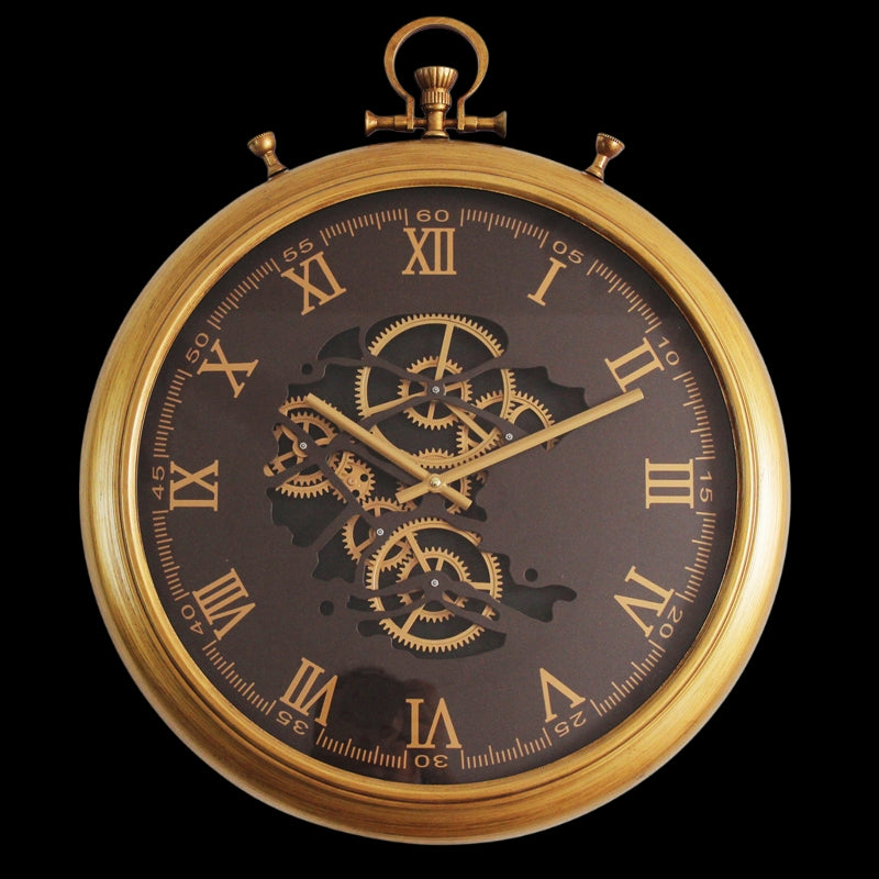 A round gold-colored wall clock with Roman numerals and a visible gear mechanism in the center.