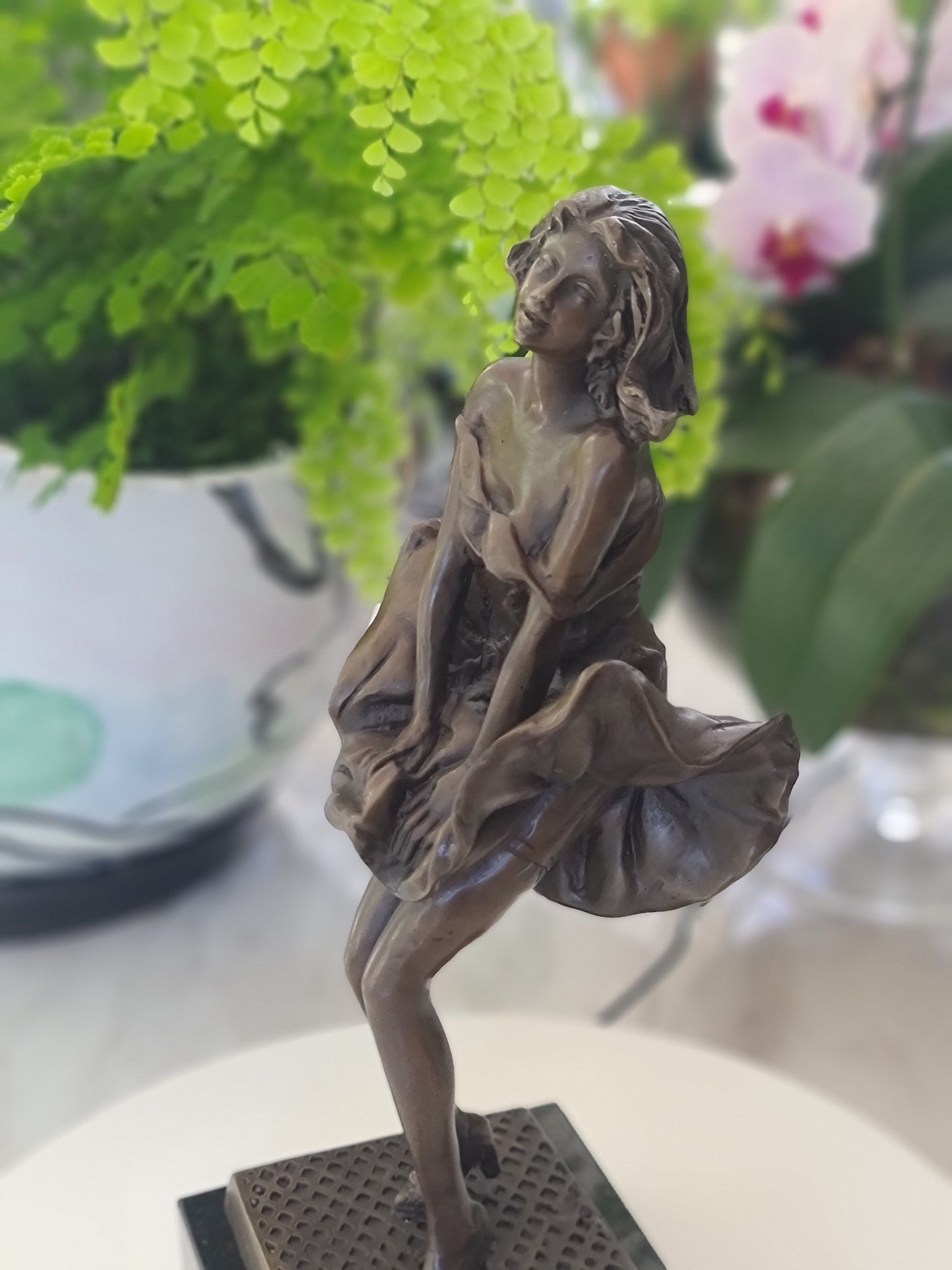 Marilyn Monroe bronze Sculpture on marble top