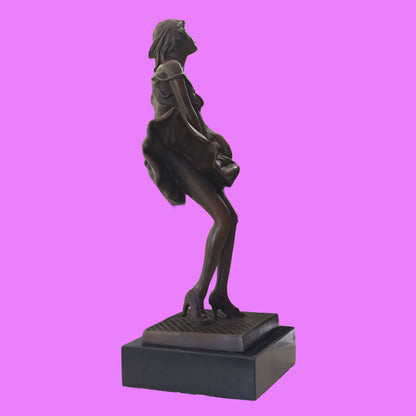 Marilyn Monroe bronze Sculpture on marble top