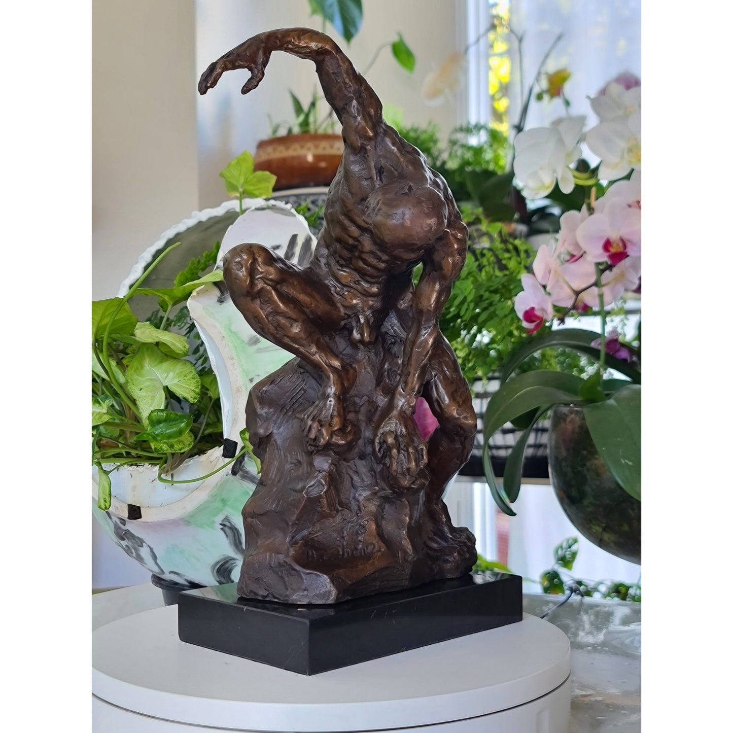 An Imposing Sculpture Of Naked Muscular Man