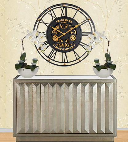 TRADEMARK 60.5 Cm Black & Gold Roman Numeral Moving Gear Wall Clock