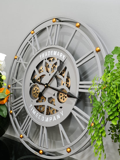 TRADEMARK 60.5  Cm Grey & Gold Roman Numeral Moving Gear Wall Clock