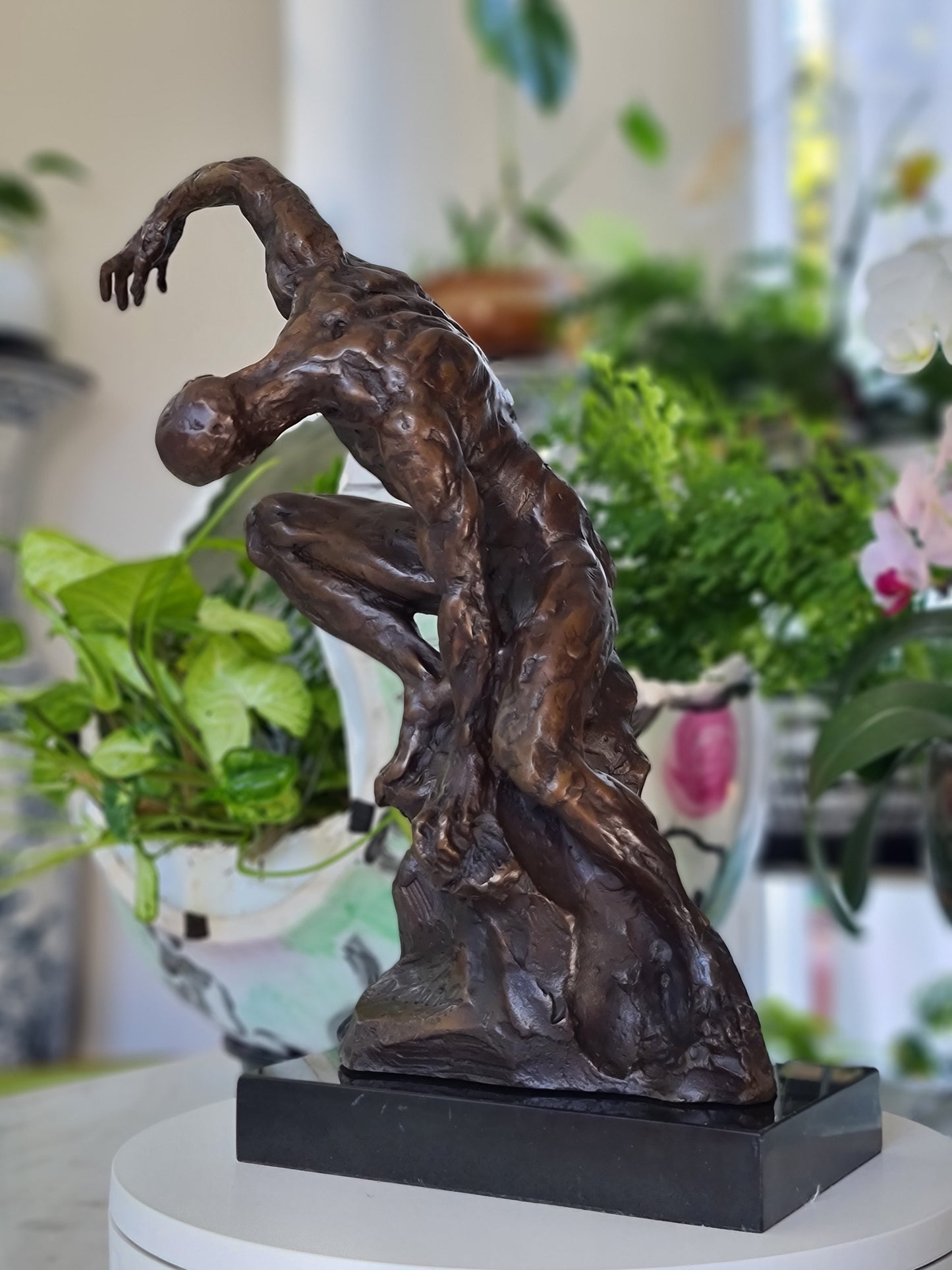 An Imposing Sculpture Of Naked Muscular Man