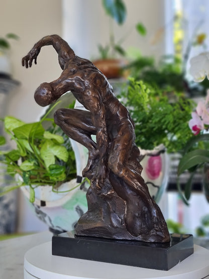 An Imposing Sculpture Of Naked Muscular Man